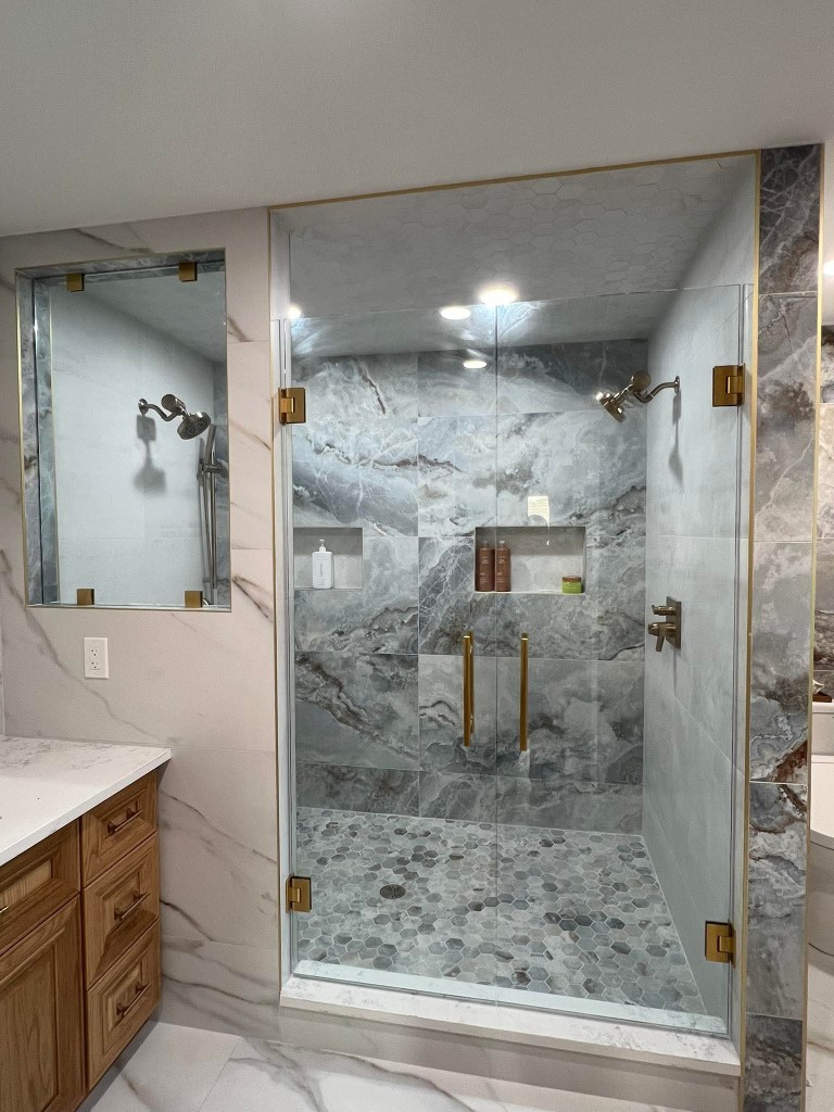 Single frameless shower door on a San Jose tub-shower combo