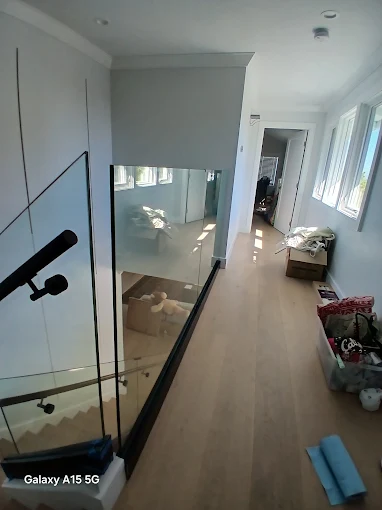 Glass panels on a stair railing in Fremont